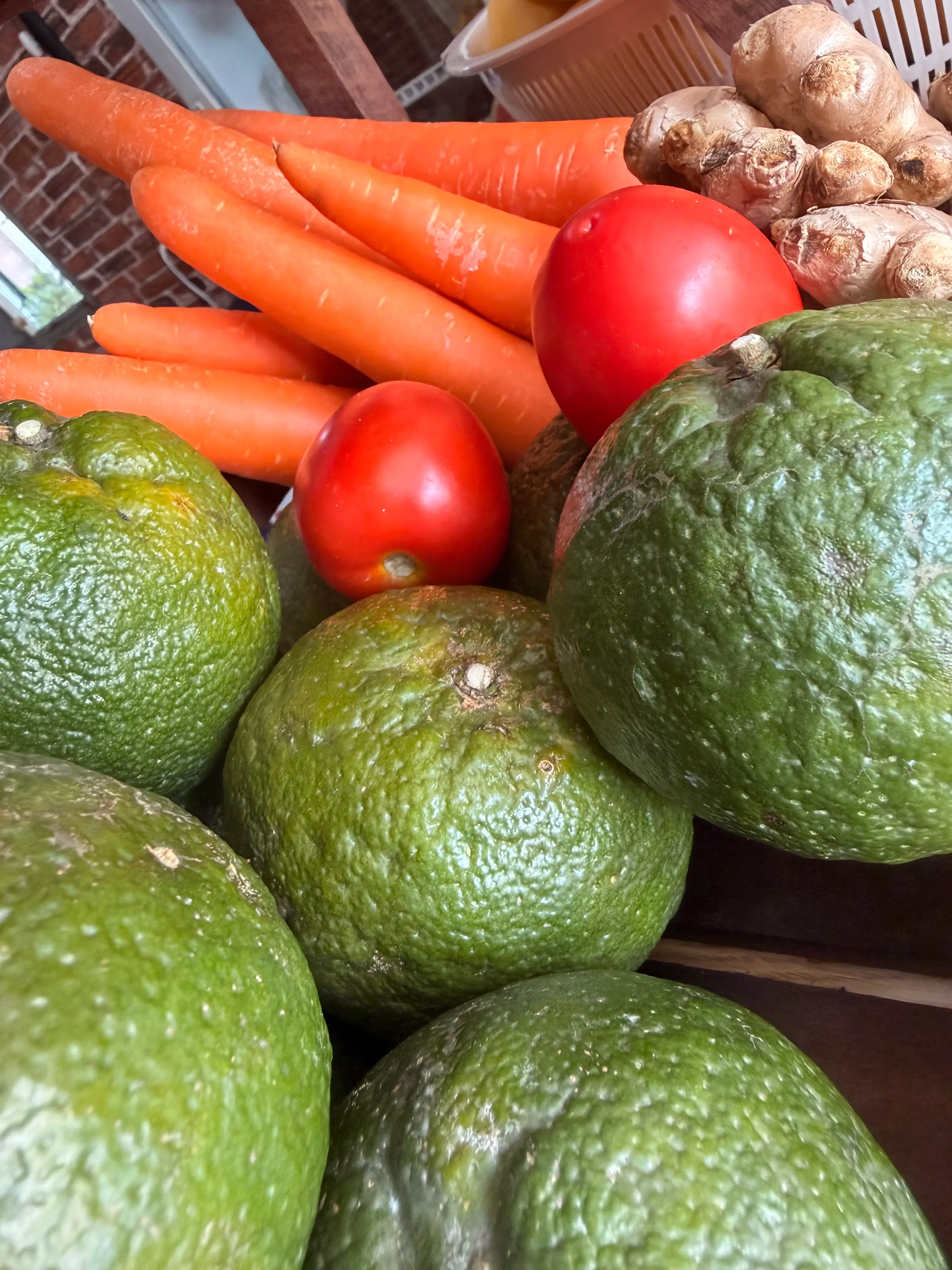 Local produce — oranges, carrots, ginger